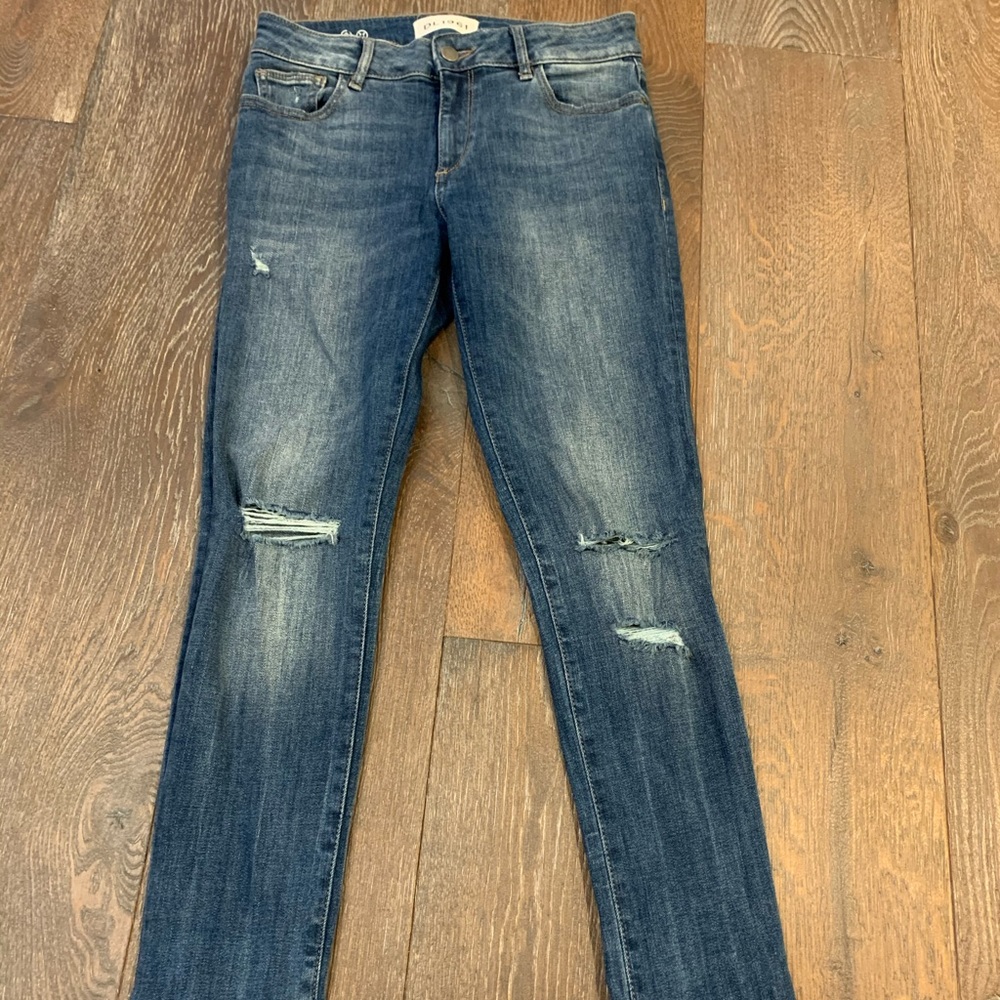 distressed denim jeans